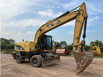 حفارة على عجلات CATERPILLAR M320