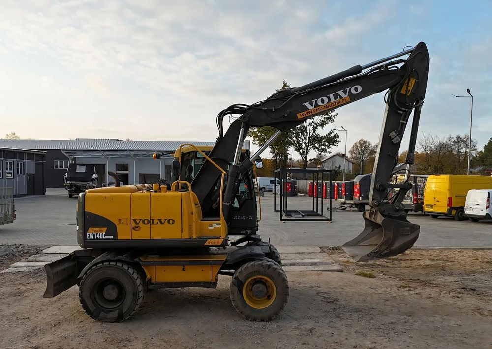 حفارة على عجلات Volvo EW 140C | ROTOTILT: صور 9