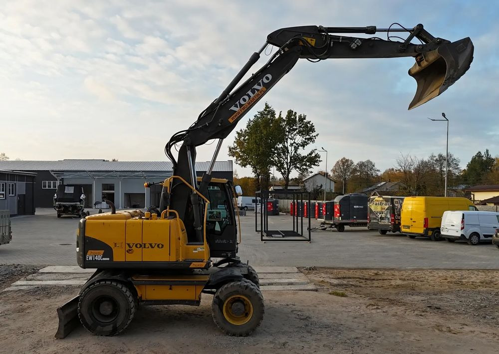 حفارة على عجلات Volvo EW 140C | ROTOTILT: صور 14