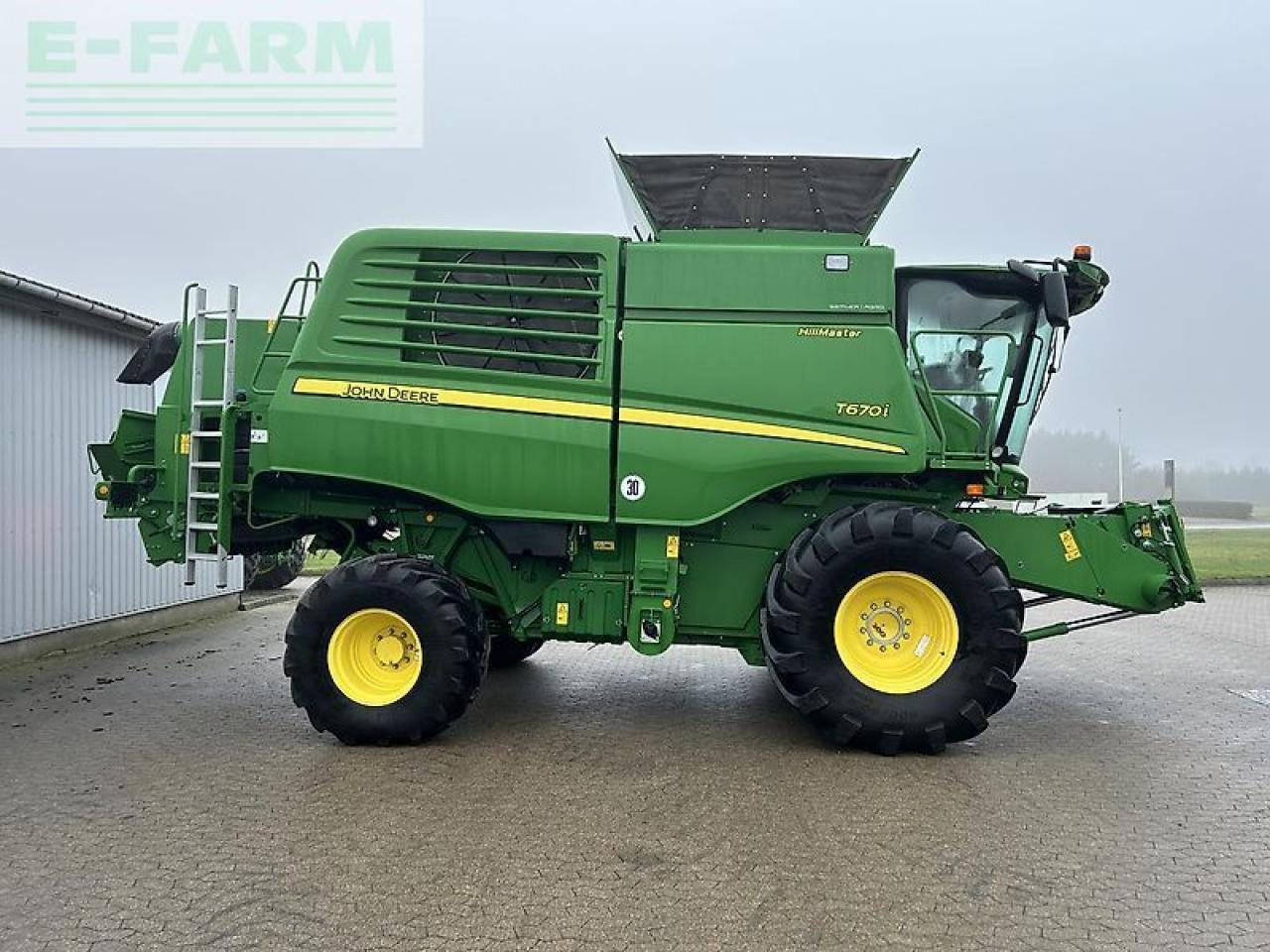 حصادة شاملة John Deere t670: صور 11