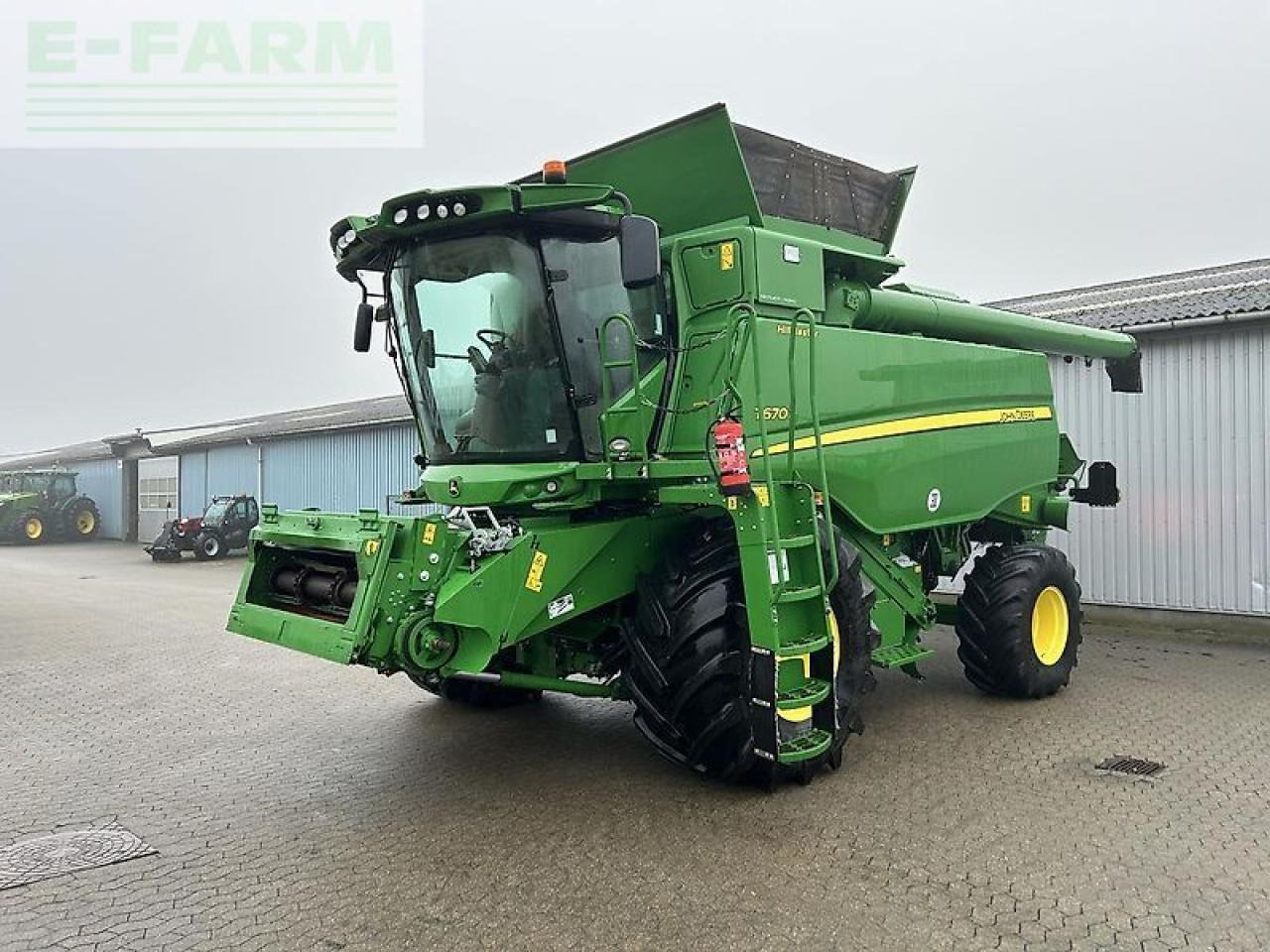 حصادة شاملة John Deere t670: صور 8