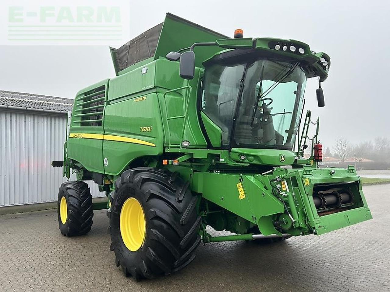 حصادة شاملة John Deere t670: صور 10